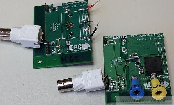 圖1：這里僅在左側(cè)的電路板上配備了半橋配置，右側(cè)的電路板配備了完整的DC-DC轉(zhuǎn)換器。香蕉插座可將測試板連接至電子負(fù)載。通過BNC連接器可連接至外部脈沖發(fā)生器。